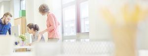 Background image showing people at work